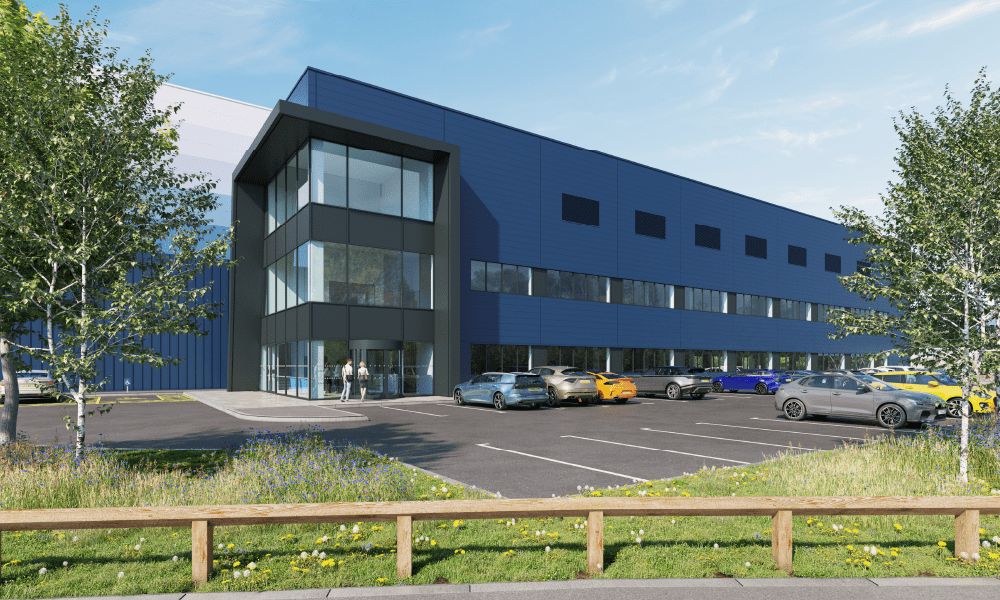 Exterior of G-Park Manchester Trafford Park with dark blue walls and multiple parking spaces for cars