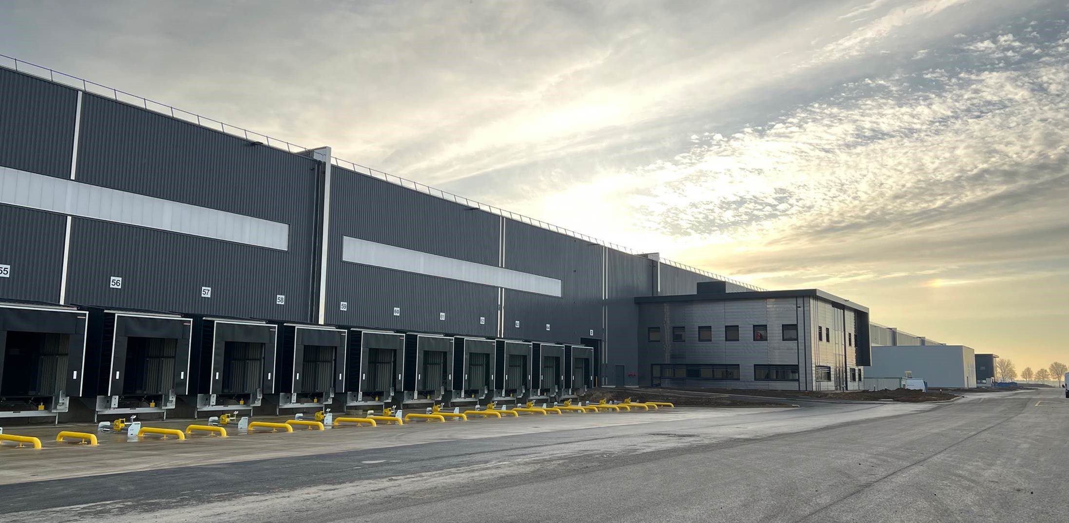 Exterior loading area of GLP Park Ablaincourt with multiple loading bays and black walls