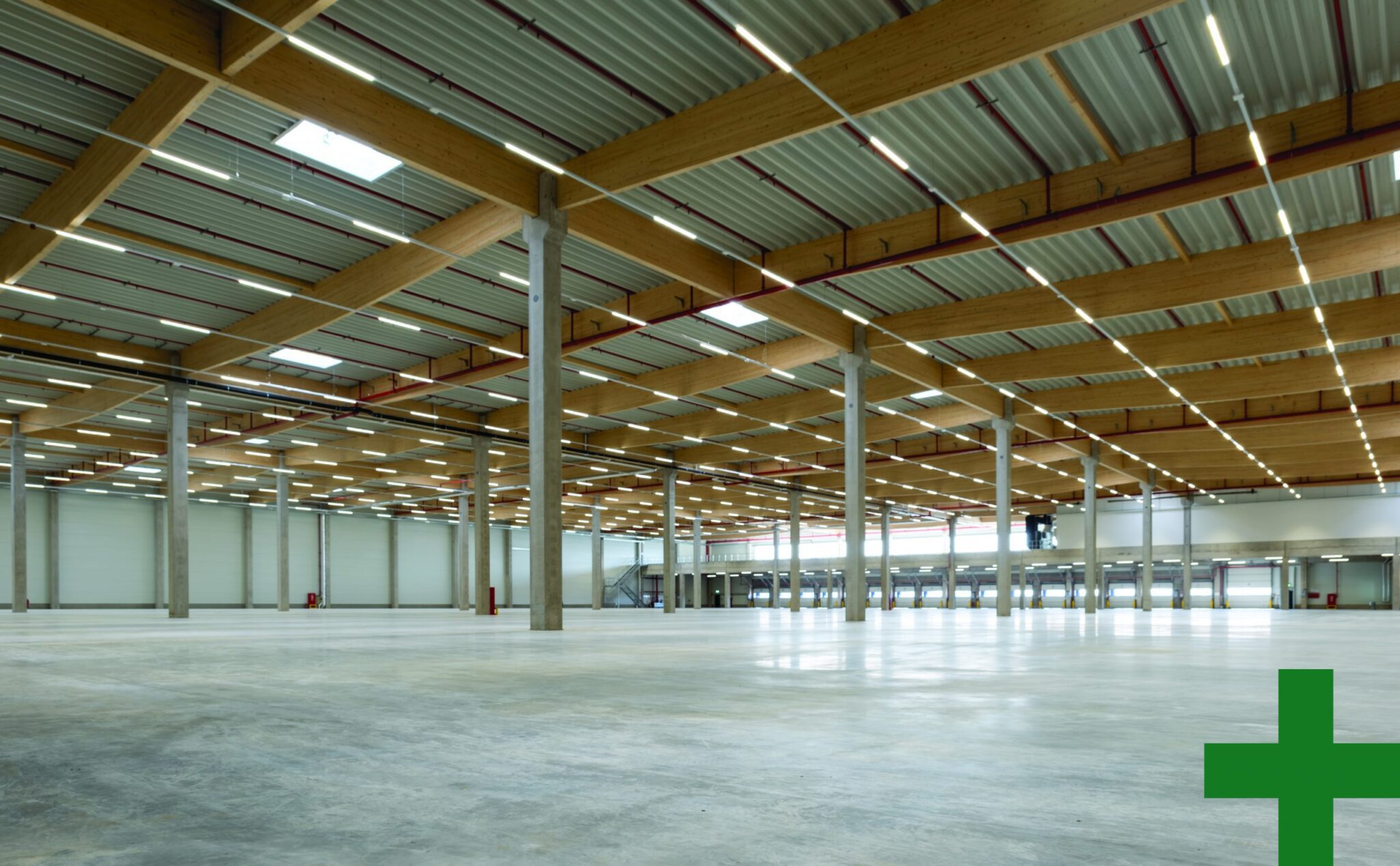 Empty warehouse with large floor space.