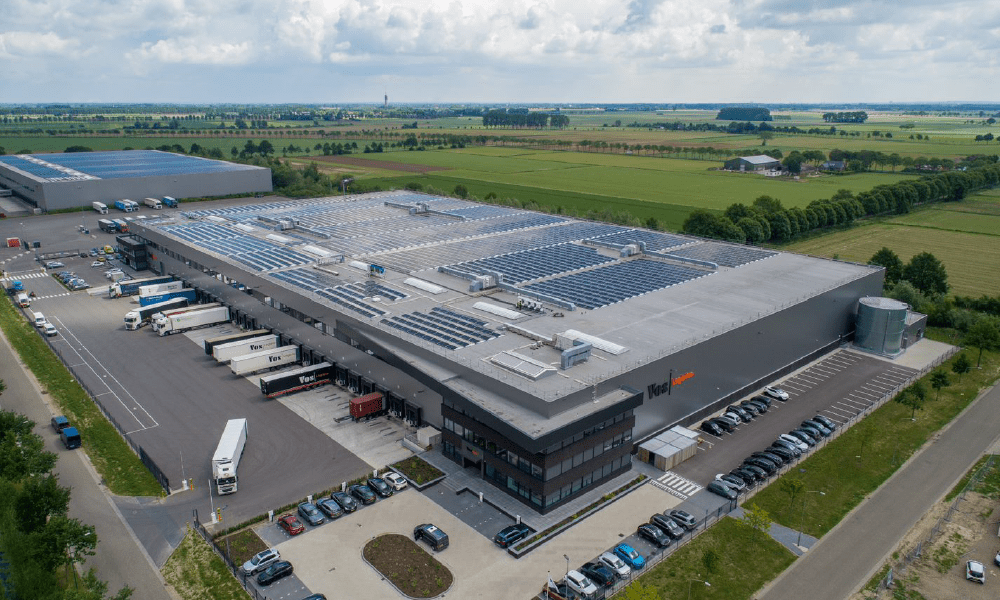 Aerial shot of a GLP warehouse with solar panels on the roof.